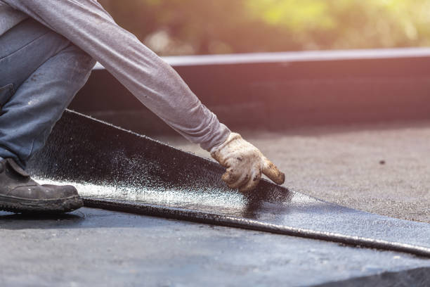 Professional Basement Waterproofing technician working in Coral, MI